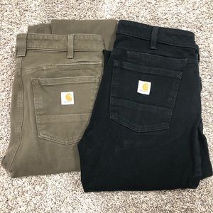 Two pairs of women’s slim fit carhartt pants